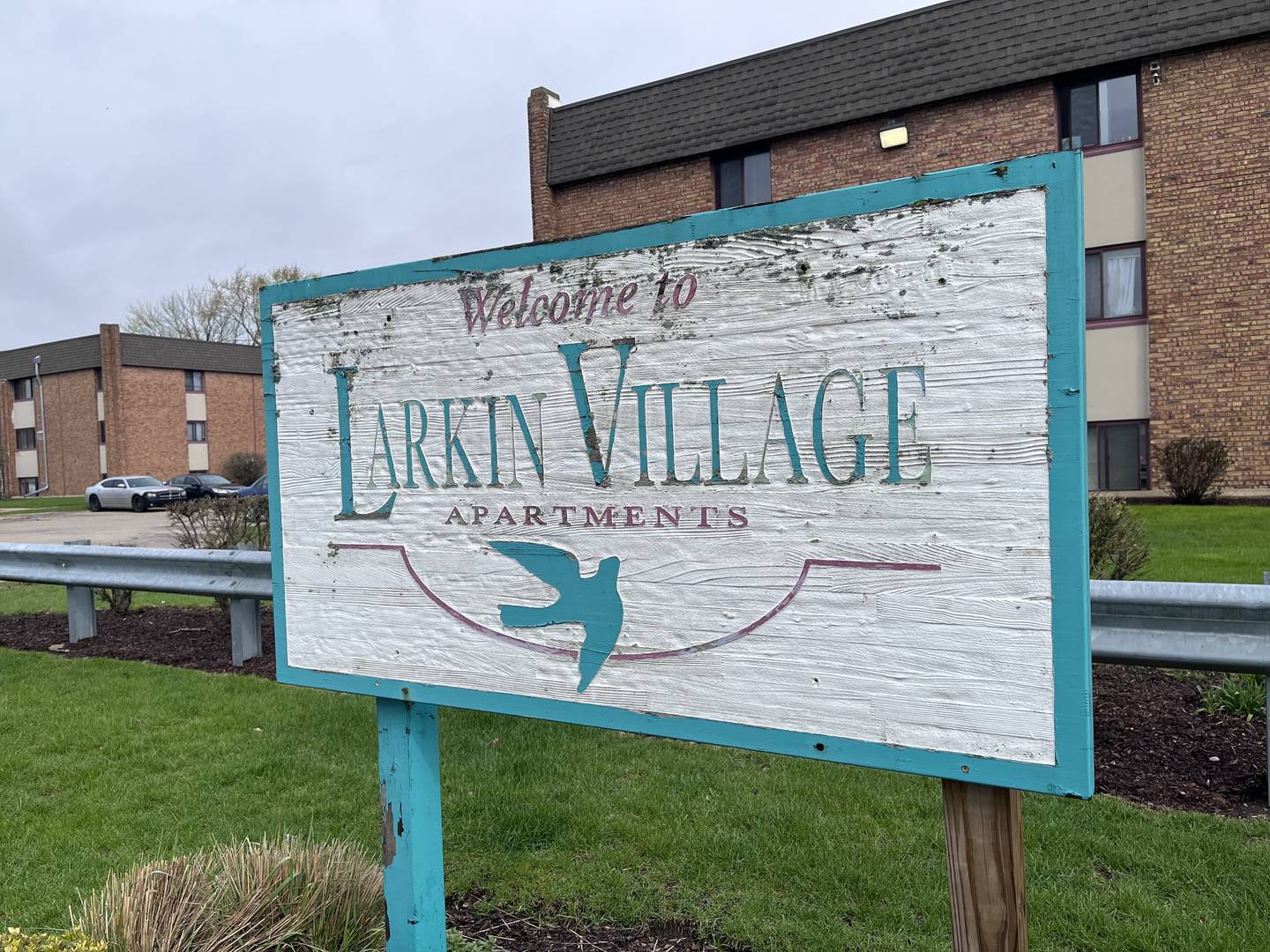 A sign for Larkin Village apartments seen on Friday, April 10, 2026, in Joliet.