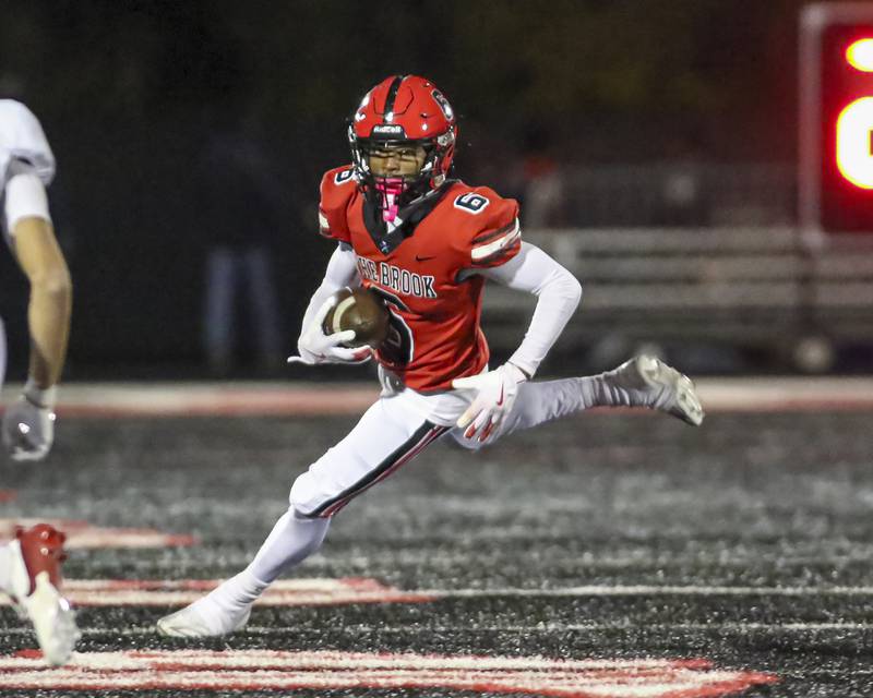 Bolingbrook's Caleb Wallace (6) runs after a short catch during football game between Yorkville at Bolingbrook Friday, Oct 24, 2025 in Bolingbrook.