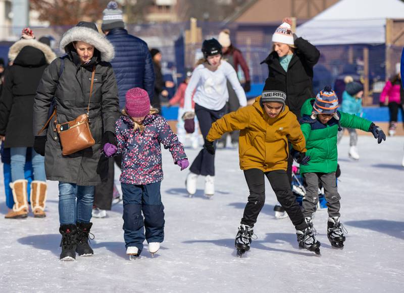 Attendees enjoy the open ice skate rink during the Wheaton Park District's Ice-A-Palooza at the Central Athletic Complex  in Wheaton on Saturday, Feb. 4, 2023.