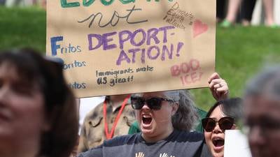 Photos: Dozens gather at NIU to rally in support of international students and staff