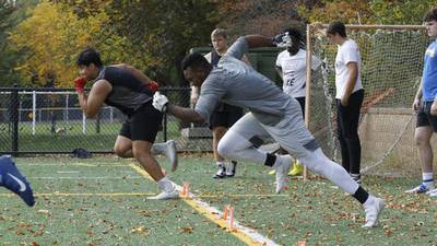 'We're all fighting to improve' FIST Football Academy trains, provides exposure for state's linemen