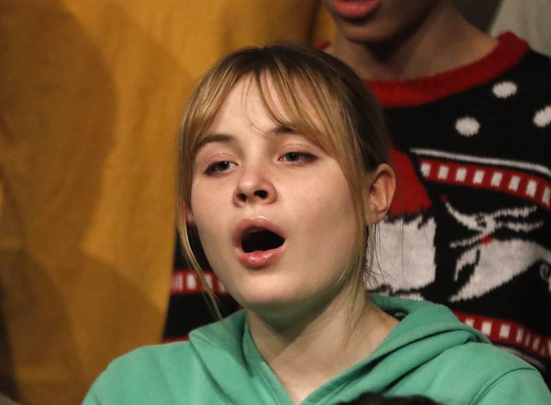 Kamila Kay sings on Thursday, Dec. 7, 2023, during a rehearsal for the Woodstock High School's “Across the Universe” concert.