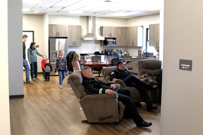 A family tours the day room at DeKalb Fire Station No. 4 at 1130 S. Malta Road at a grand opening event on Saturday, April 26, 2025.