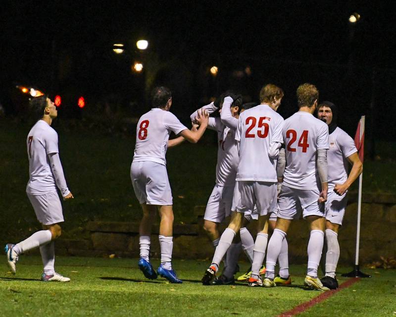 Benet Academy’s soccer team celebrates with William Khazen, right, after William scores a goal during the class 2A super sectional soccer match on Tuesday Nov. 5, 2024, held at Wheaton Academy in West Chicago while taking on Prairie Ridge.