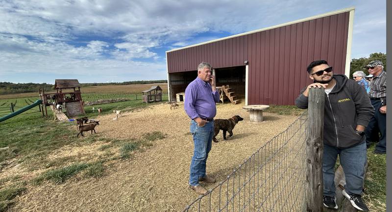 Tim Ponto (center) talks to visitors during the Ogle County Farm Stroll on Sunday, Oct. 12, 2025. Tom and his wife, Dede, own and operate Ponto Ranch, where they raise Nigerian dwarf dairy goats.