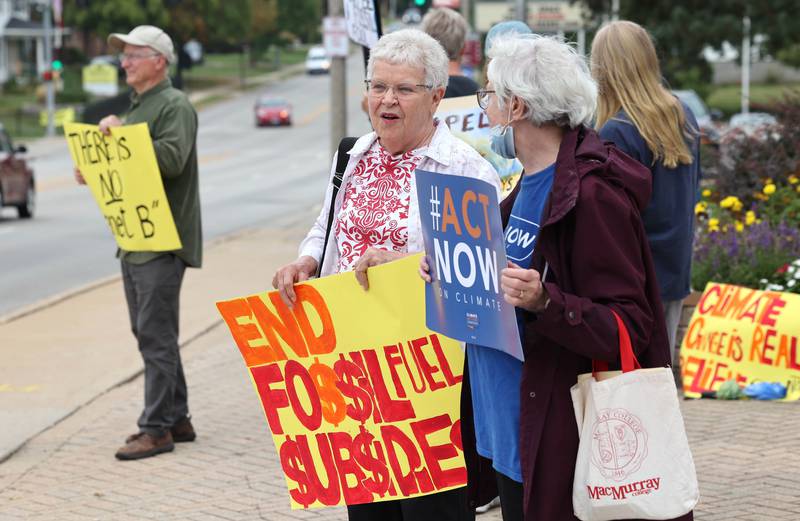 People gather for a rally Saturday, Sept. 16, 2023, at Memorial Park in downtown DeKalb. The demonstration was held to push legislators to promote alternative forms of energy and lessen the use of fossil fuels.