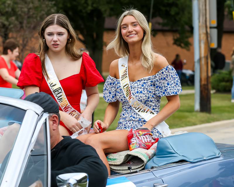 Students of the homecoming court ride in the Glenbard West Homecoming Parade.  Sept 16, 2023