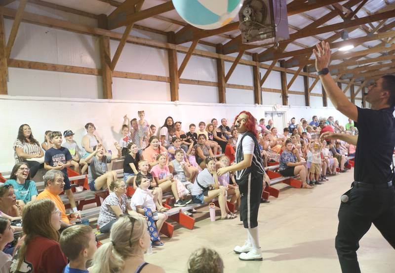 The Great Pages Circus clown hits a beach ball into the audience during a performance on Monday, June 23, 2025 at the Bureau County Fairgrounds in Princeton. The Great Pages Circus is a family-friendly, traveling circus that blends traditional circus acts with a modern, energetic style.