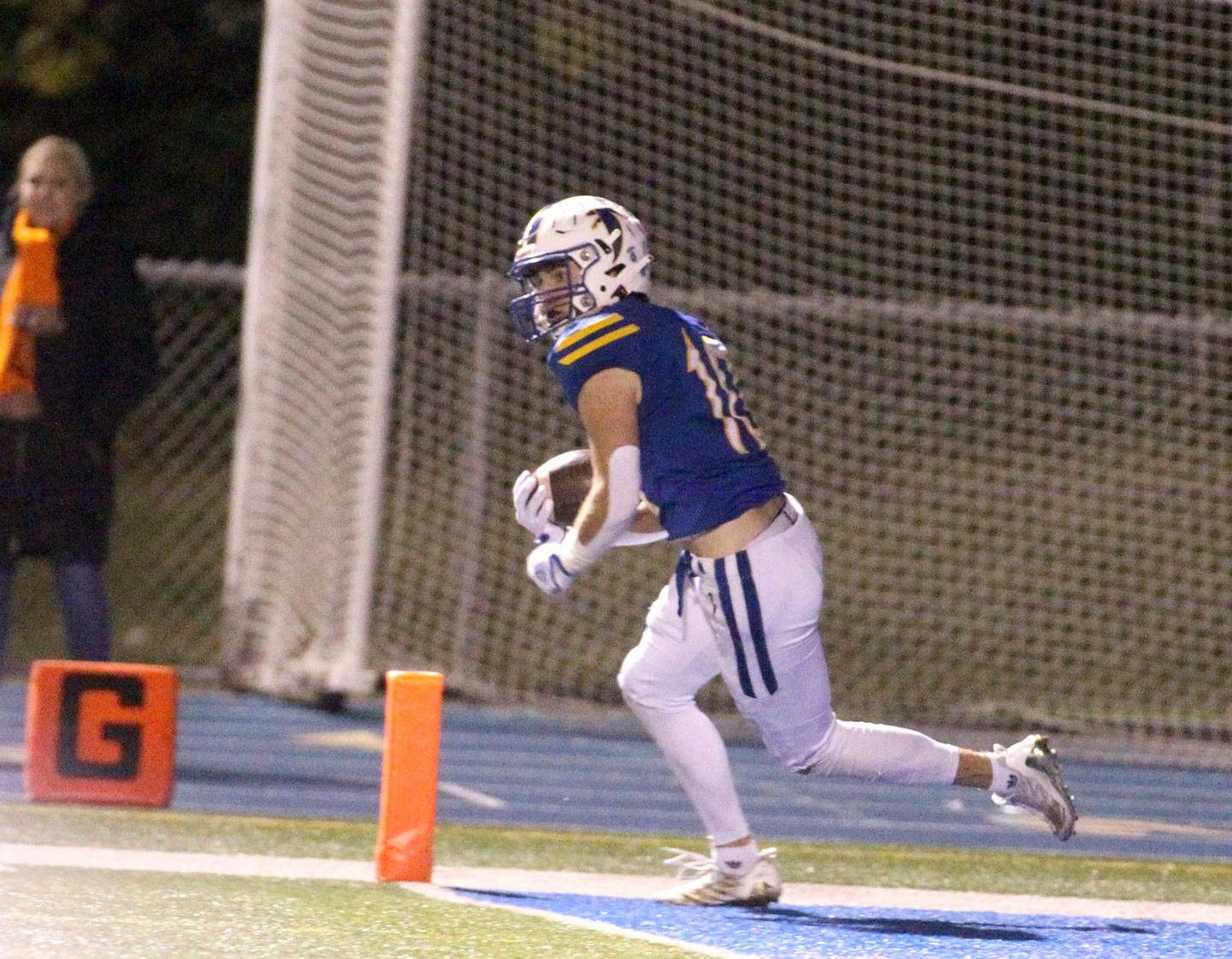 Wheaton North’s Tyler O'Connor makes an interception in Wheaton Warrenville South’s endzone during a game at North on Friday, Oct. 7, 2022.
