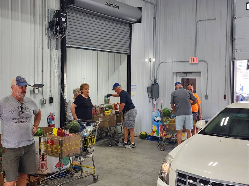 Around 60 volunteers were scheduled to help on Wednesday as the pantry held both morning and evening distribution times.