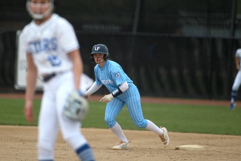 Lake Park's Ava Arenz leads off from second base during a game against St. Charles North on Wednesday, April 30, 2025 in St. Charles.