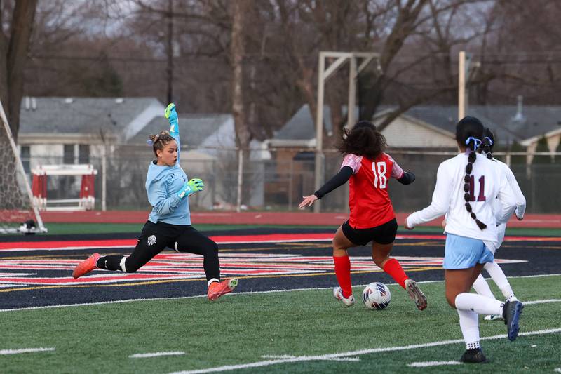 Kankakee goalkeeper Ana Lopez shuts down an approach by Bradley-Bourbonnais' Mia Lawrence (18) during the Boilermakers' 3-2 victory over Kankakee in the All-City matchup on Thursday, March 27.
