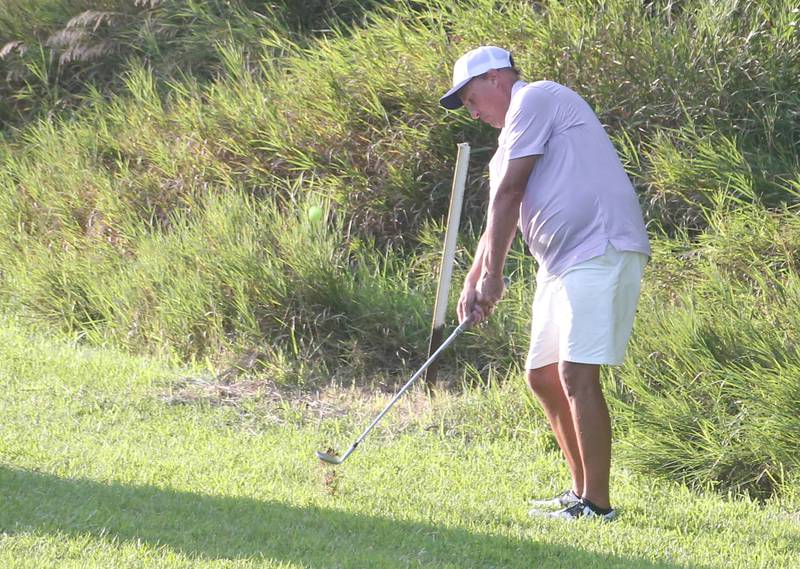Brian Lehr hits his ball to the green during the Illinois Valley Mens Golf Championship Tournament on Sunday, July 27, 2025 at Spring Creek Golf Course in Spring Valley.