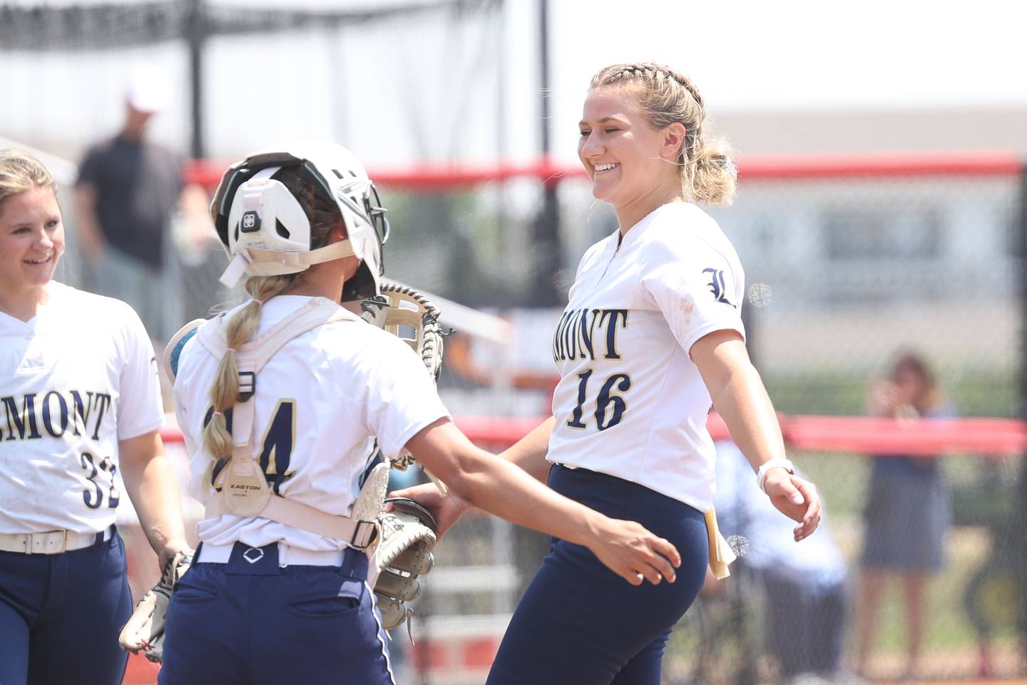 Lemont’s Sage Mardjetko, right, is greeted by Frankie Rita after a strike out to end the top of the 12th inning against Antioch in the Class 3A state championship game on Saturday, June 10, 2023 in Peoria.