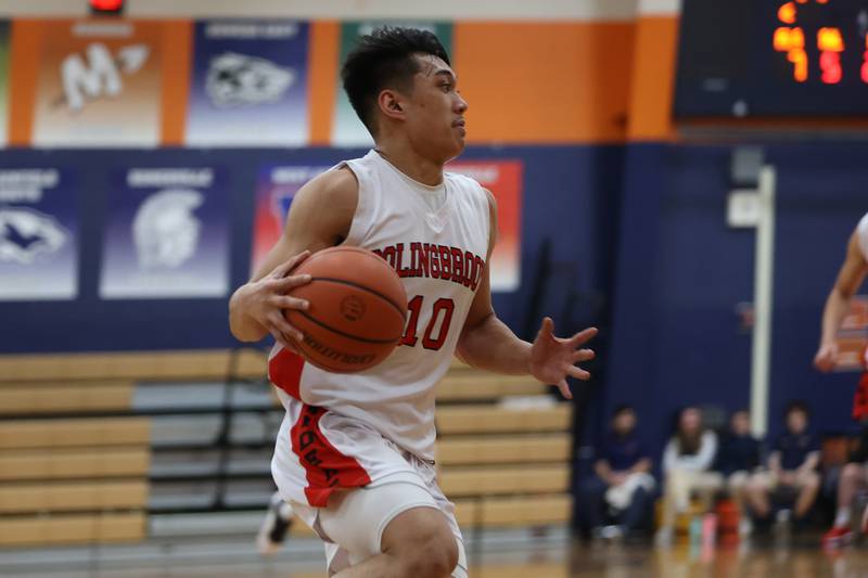 Bolingbrook’s MJ Langit drives to the basket against Andrew in the Class 4A Oswego Sectional semifinal. Wednesday, Mar. 2, 2022, in Oswego.