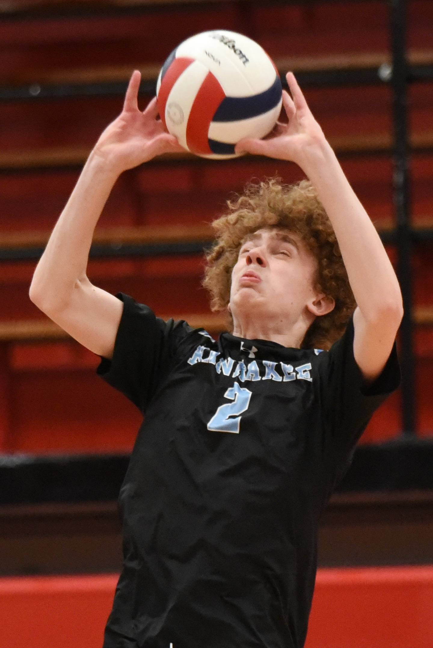 Kankakee's Miles Yohnka sets the ball during a game at Bradley-Bourbonnais Thursday, April 9, 2026.