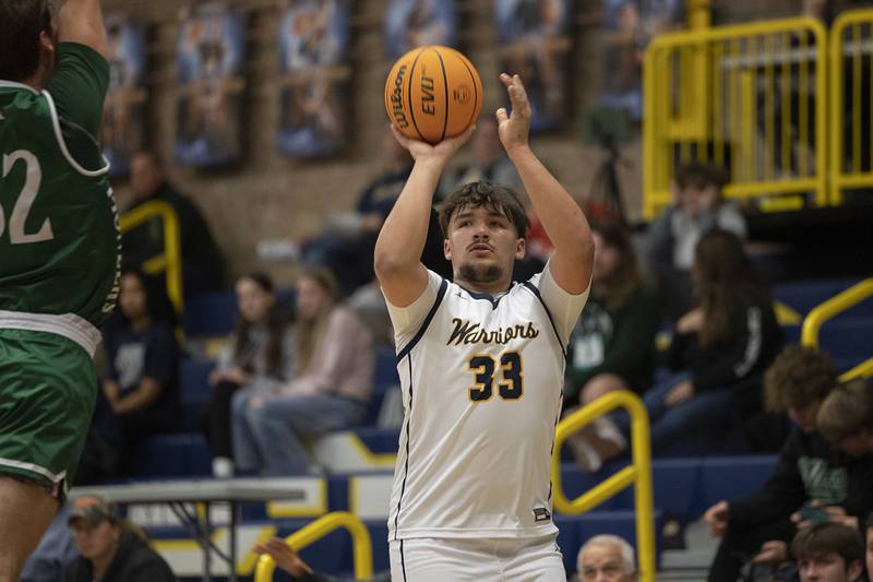 Sterling’s Maddux Osborn puts up a shot against Alleman Friday, Dec. 20, 2024, at Sterling High School.
