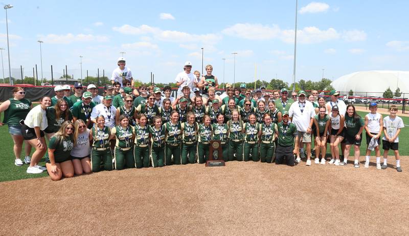 Members of the St. Bede Lady Bruins softball team pose with the Class 1A championship trophy after defeating Illini Bluffs on Saturday, June 3, 2023 at the Louisville Slugger Sports Complex in Peoria.