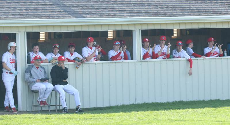 Ottawa players and coaches watch the game from the dugout against Morris on Monday, April 20, 2026 at Ottawa High School.