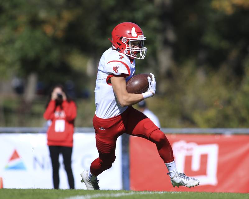 Hinsdale Central's Thomas Skokna (7) runs back the opening kickoff during football game between Hinsdale Central at Glenbard West. Oct 23, 2021.