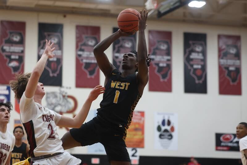 Joliet West’s Justus McNair puts up a shot against Plainfield North on Friday, Dec.15th, 2023 in Plainfield.