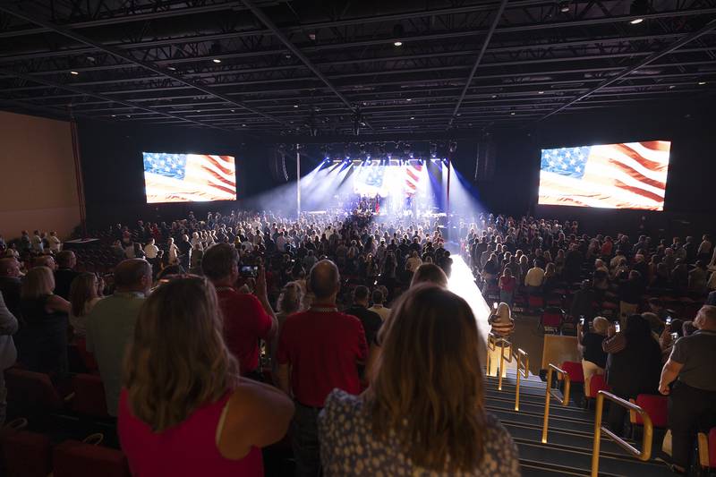 VIPs stand for the flag for the opening Thursday, Aug. 29, 2024, of the Hard Rock Casino Rockford.