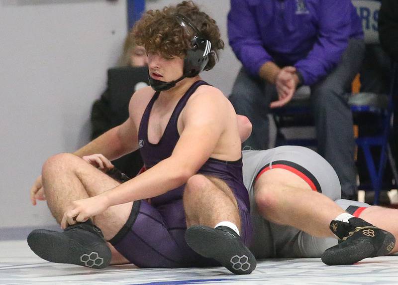 Dixon's William Howell wrestles during the 60th annual Lyle King invitational wrestling tournament on Saturday, Jan. 6, 2023 in Princeton.