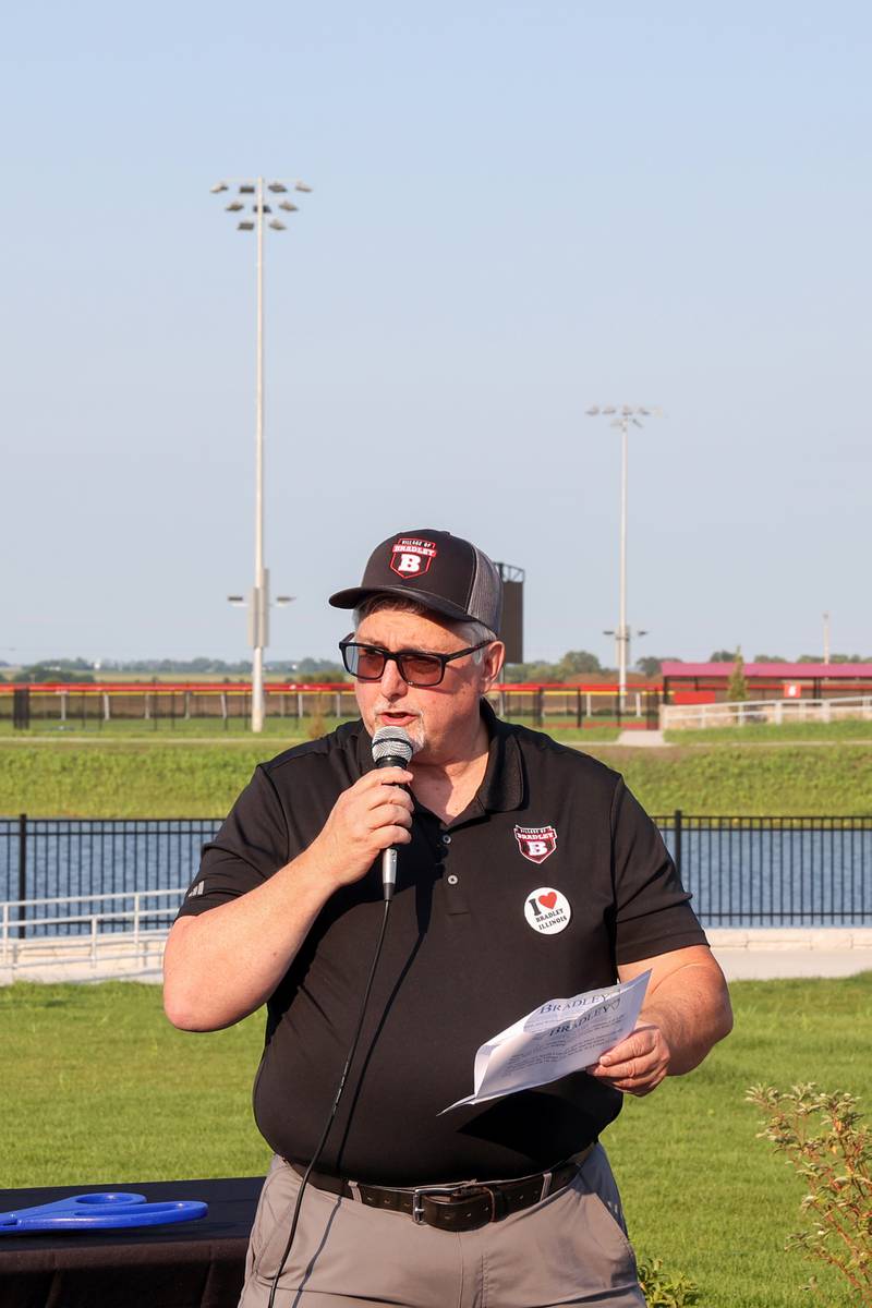 Bradley Mayor Mike Watson speaks to the crowd ahead of a ribbon cutting for Bradley's 315 Sports Park during a Bradley Business After Hours event on Tuesday, July 29, 2025.