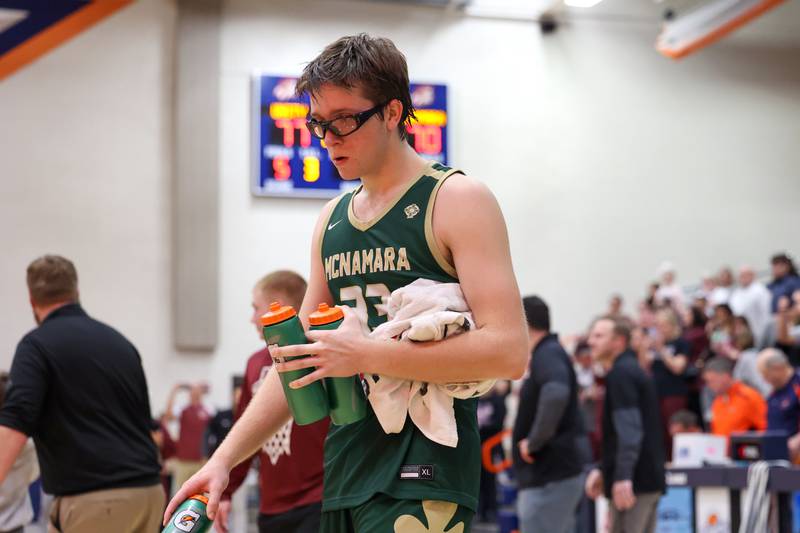 Bishop McNamara's Callaghan O'Connor heads to the locker room following the Fightin' Irish's 77-70 loss to Tolono Unity in the IHSA Class 2A Pontiac Supersectional on Monday, March 9, 2026.