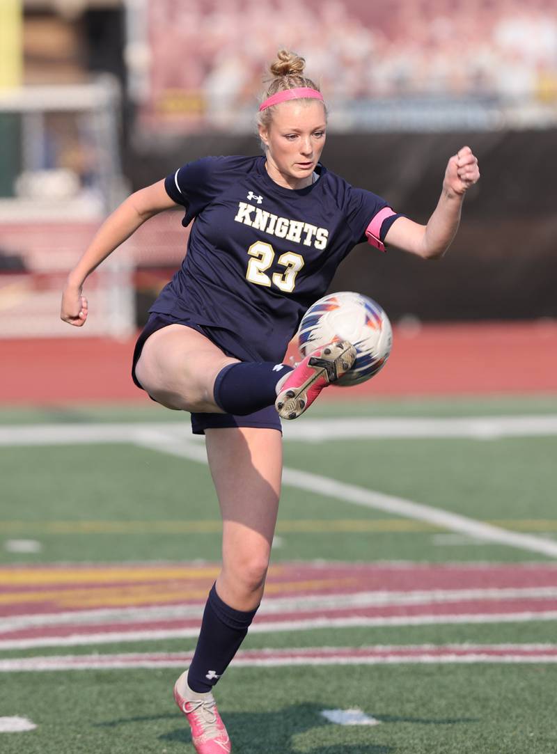 IC Catholic's Molly Ryan (23) kicks the ball down field during the IHSA Class 1A girls soccer super-sectional match between Richmond-Burton and IC Catholic at Concordia University in River Forest on Tuesday, May 23, 2023.