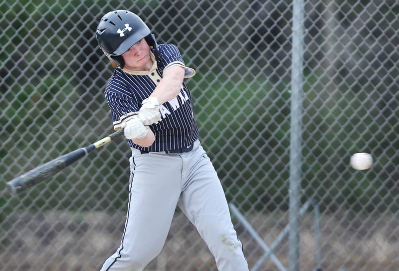 Hiawatha's Tommy Butler makes contact during their game against Indian Creek Thursday, April 20, 2023, at Indian Creek High School in Shabbona. The game was stopped in the first inning due to weather.