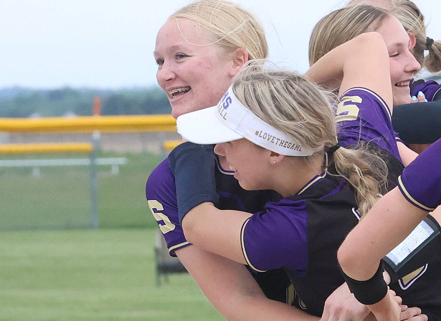 Serena pitcher Cassie Walsh reacts with teammate Maddie Young after defeating Marquette during the Class 1A Regional title game on Friday, May 22, 2026 at Serena High School.