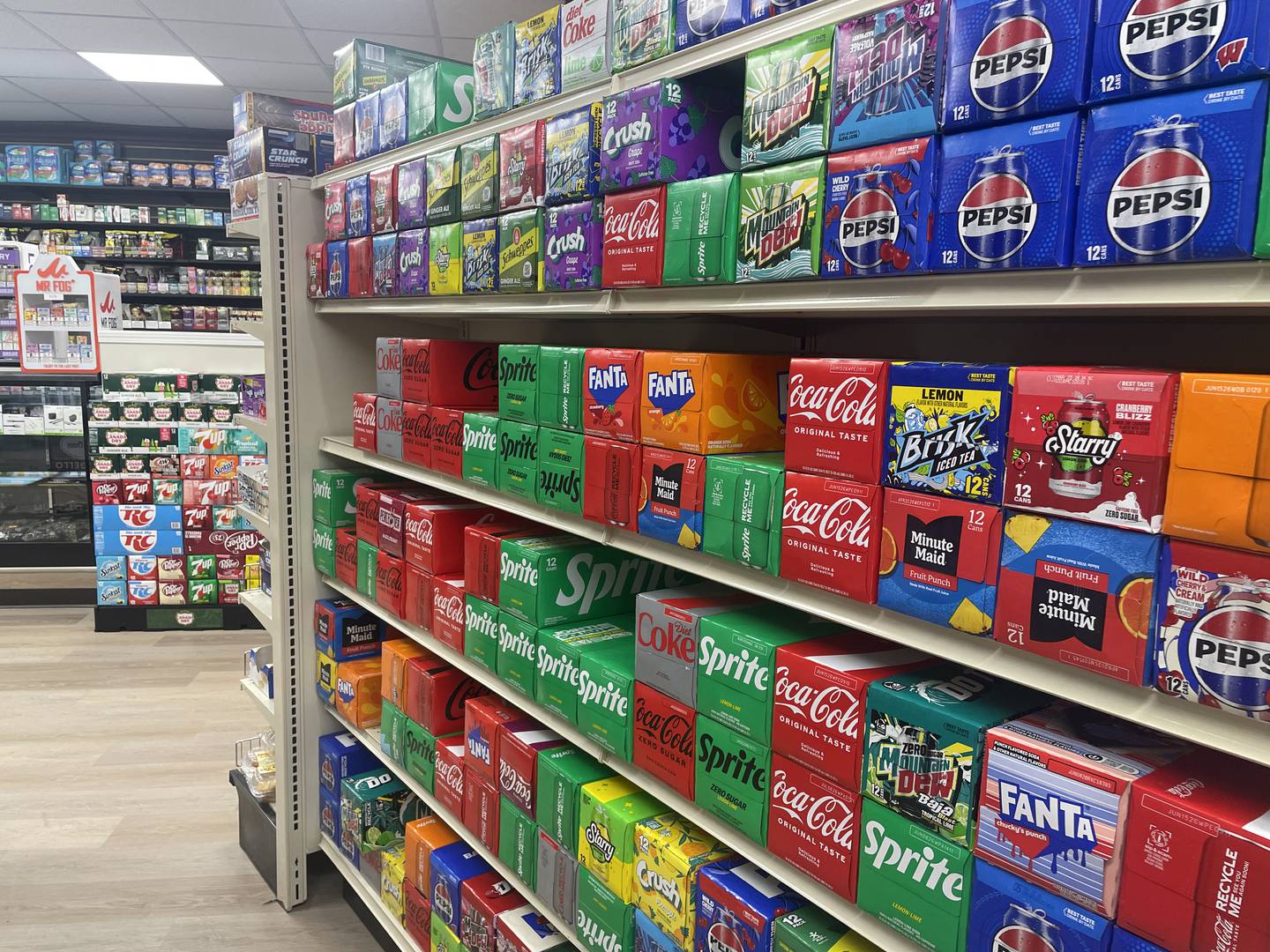 Beverages are seen Nov. 17, 2025, on the main sales floor inside Uptown Mini Market in DeKalb.