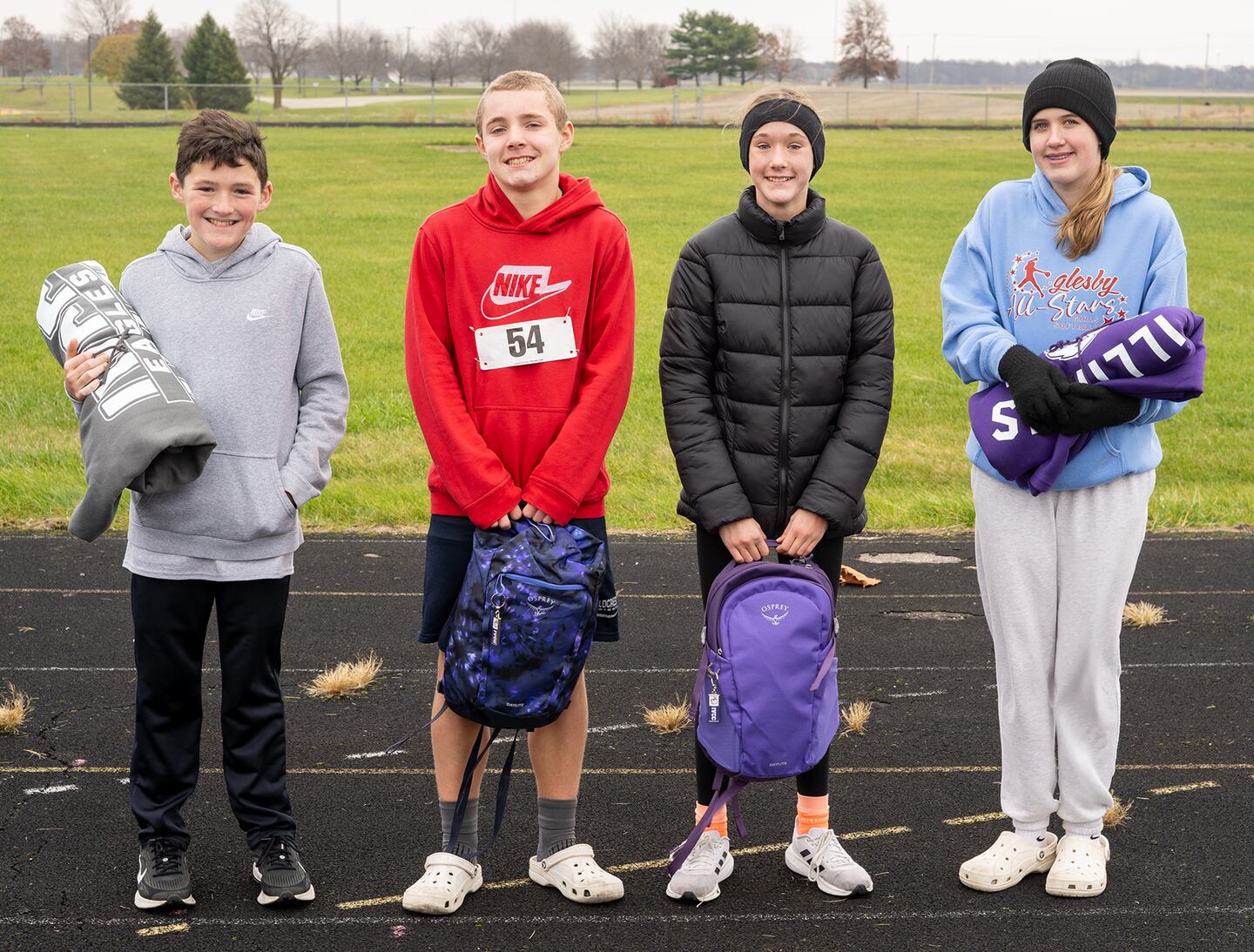 Eagles Run 2-mile winners, from left, were: Dane Hawkins, Kole C. Wesley, Lumen Setchell and Bethany Kasperski.