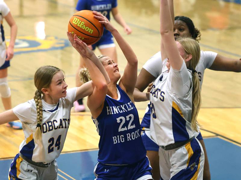 Hinckley-Big Rock's Anna Herrmann puts up a shot surrounded by three Somonauk/Leland defenders during their game Thursday, Jan. 15, 2026, at Somonauk High School.