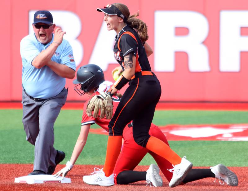 DeKalb’s Hazel Montavon, right, reacts as Huntley’s Ava McFadden is called out at second base in IHSA Class 4A Sectional Semifinal softball action at Barrington High School in Barrington on Wednesday, June 4, 2025.