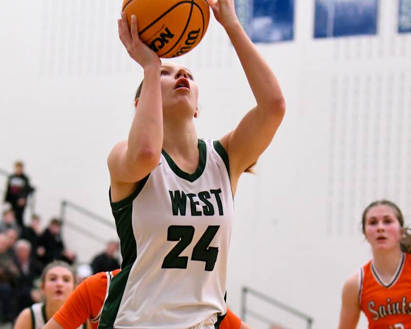 Glenbard West's Sophia Evans (24) makes a basket during the 4A Sectional championship game on Thursday Feb. 26, 2026; while taking on St. Charles East held at Bartlett High School.