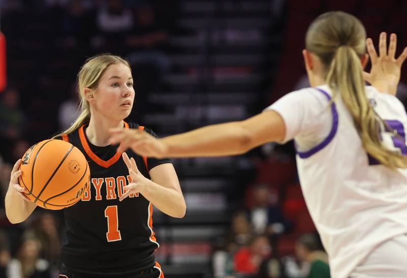 Byron's Alya Roschi looks to pass the ball around Breese Central's Alexa Morris during the Class 2A title game on Saturday, March 7, 2026 at CEFCU Arena in Normal.