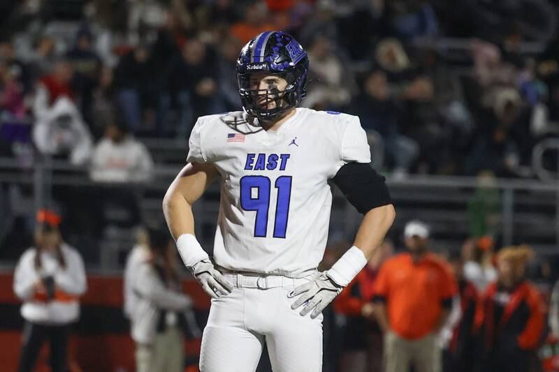 Lincoln-Way East’s Caden O’Rourke waits between snaps against Minooka on Friday, Nov. 8, 2024 in Minooka.