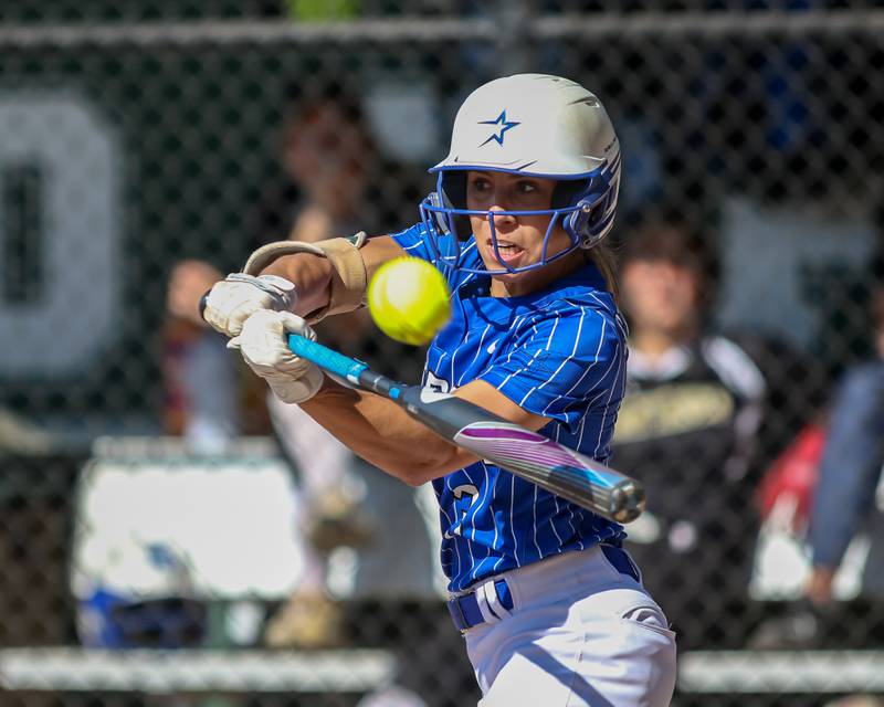 St Charles North's Leigh VandeHei (3) leads off the game with a triple during the Class 4A Glenbard West Regional Final softball game between Glenbard North at St Charles North.  May 26, 2023.