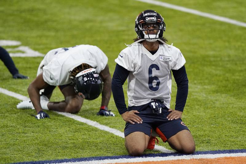 Chicago Bears cornerback Kyler Gordon warms up with teammates during the team's rookie minicamp, Friday, May 6, 2022, at Halas Hall in Lake Forest.