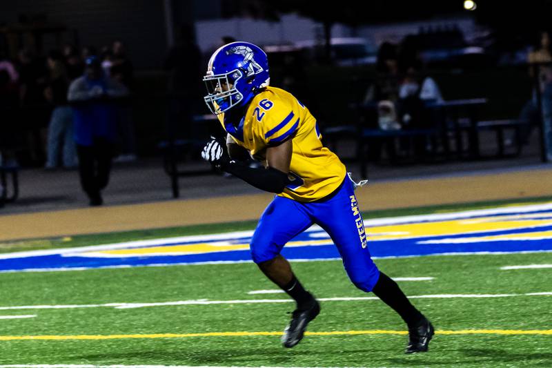 Joliet Central's Tra’vonte Nicks returns a kick-off during a varsity football home game against Plainfield Central on Sept. 26, 2025.