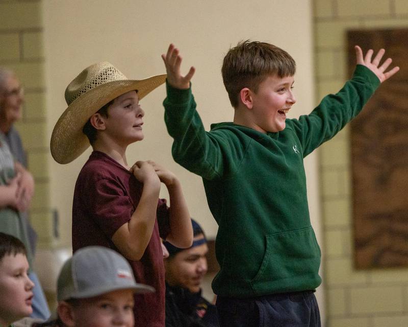 Children react to made basket in game of Donkey Basketball on Saturday, Feb. 7, 2026 at Seneca High School West Campus in Seneca.