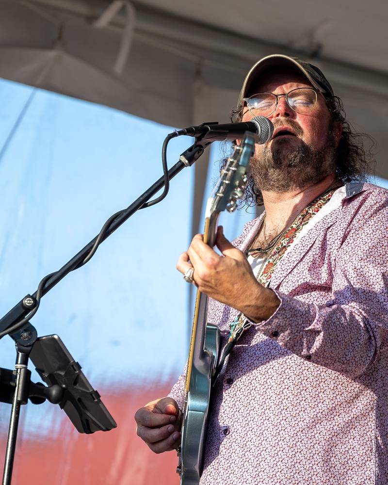 Travis Reid of the Travis Reid Band sings with emotion during performance at the BBQ & Blues Fest on Saturday, Sept. 12, 2025 on First Street in La Salle.
