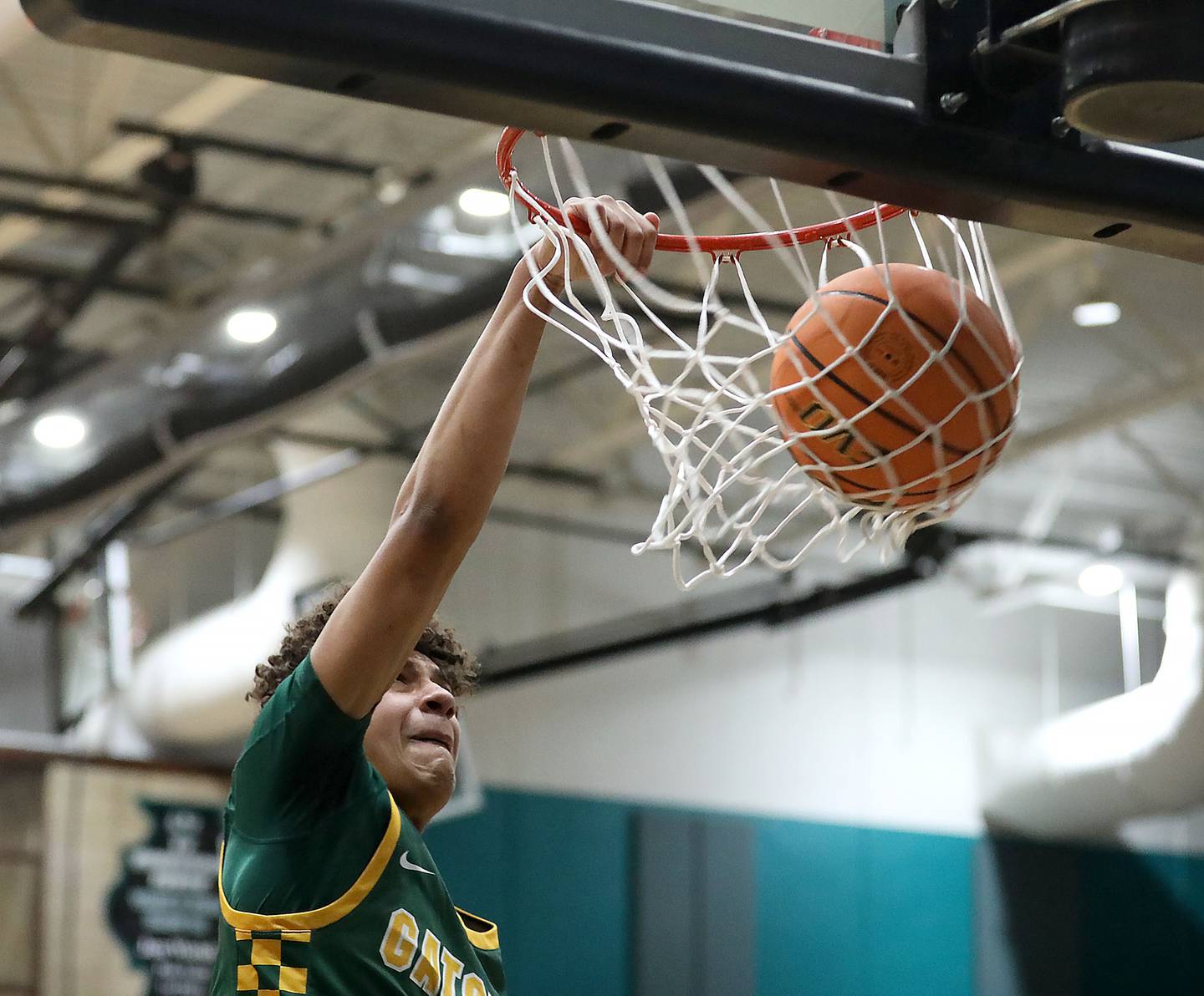 Crystal Lake South's Noah Cook dunks the ball during an IHSA Class 3A Woodstock North Sectional semifinal.basketball game against Sycamore on Wednesday, March 4, 2025, at Woodstock North High School.