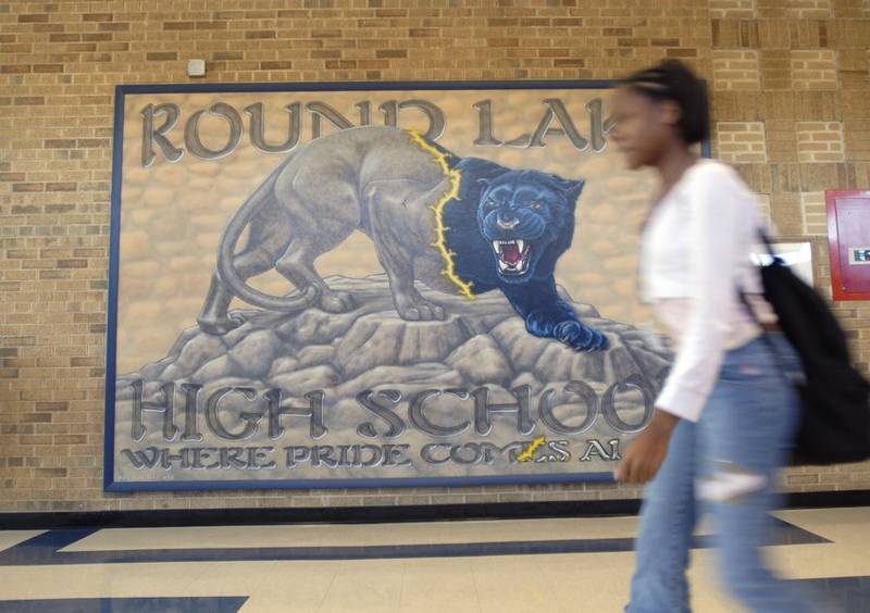 Round Lake Area Unit District 116 schools were shut down Thursday after a student who had been expelled trespassed on district property.