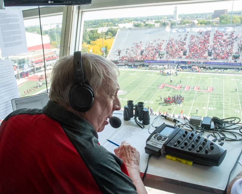 Bill Baker, U.S. Air Force veteran and Northern Illinois University's radio announcer, speaks during a broadcast as NIU takes on Tulsa University on Saturday, Sept. 23, 2023, at Huskie Stadium in DeKalb.