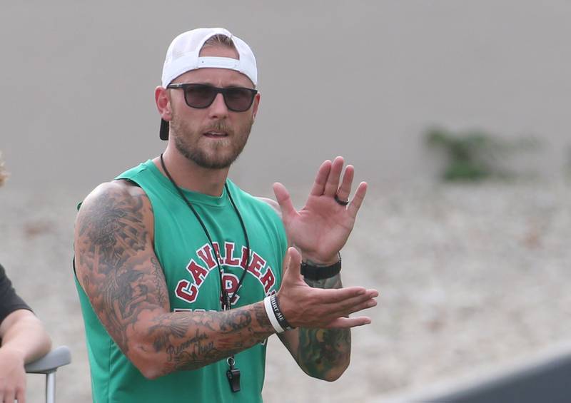L-P head football coach JJ Raffelson cheers on his team during a joint practice with St. Bede on Monday July 21, 2025 at Howard Fellows Stadium.