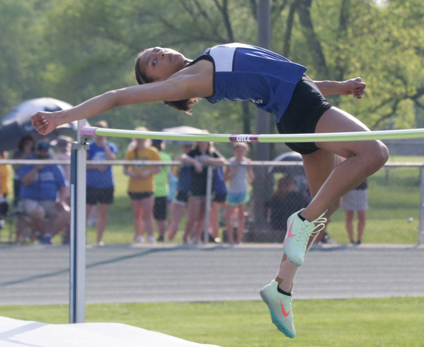 Newark's Kiara Wesseh arches to clear the bar in the high jump at the Class 1A sectional girls track meet on Thursday, May 12, 2022, in Seneca.
