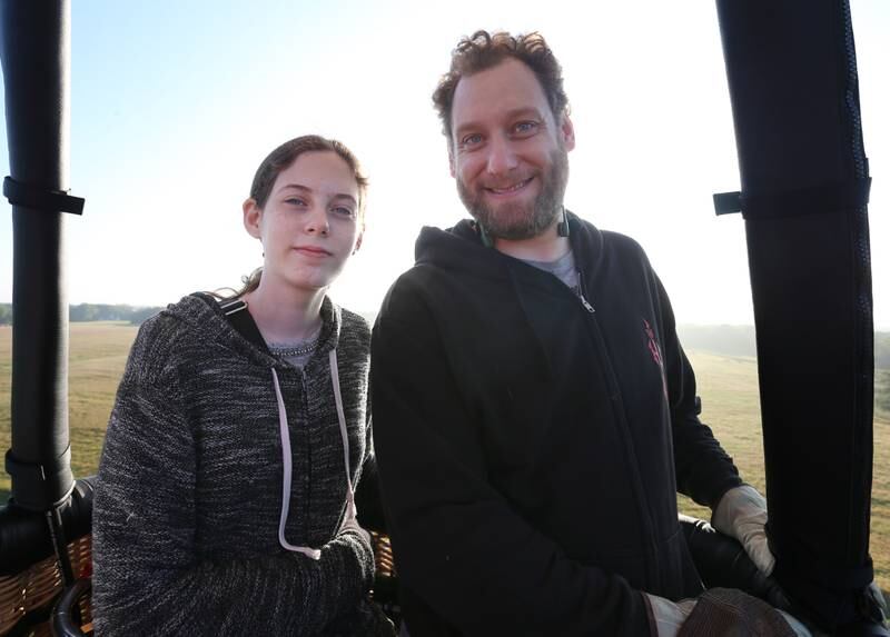 Candance Lesman and her father Isaac ride in a hot air balloon during the 52nd annual Homestead Festival on Saturday, Sept. 9, 2023 in Princeton.